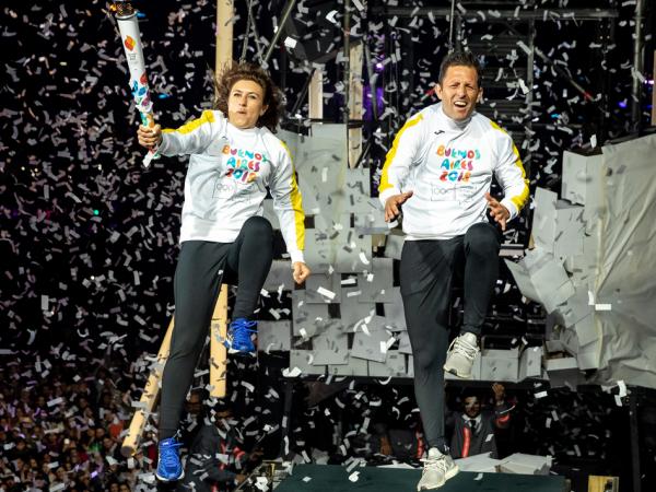 Cecilia Carranza Saroli smashed through with the Olympic Torch